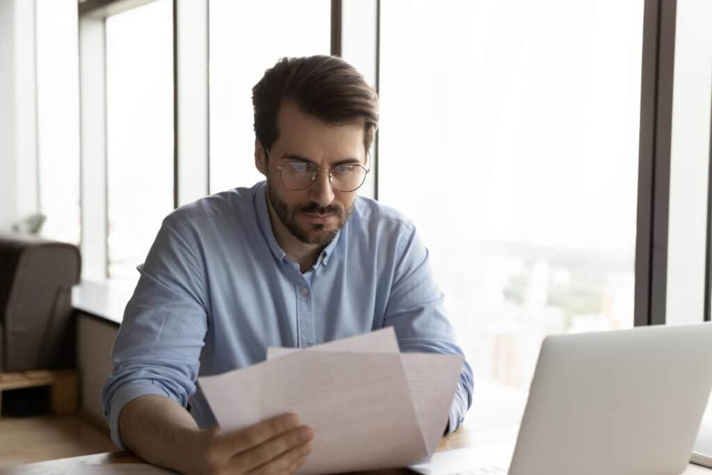 man checking documents for us travel