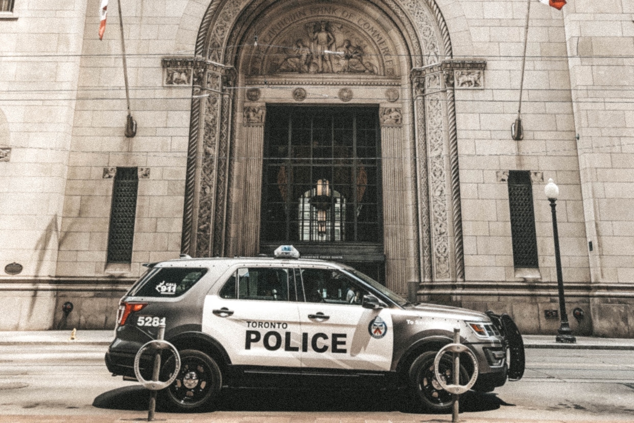 Police car in front of government building in Toronto